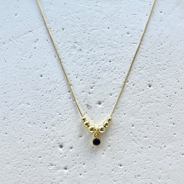 Cadena Azul Mar delgada con dije de piedra azul balines dorados y topos a juego MariaBolo