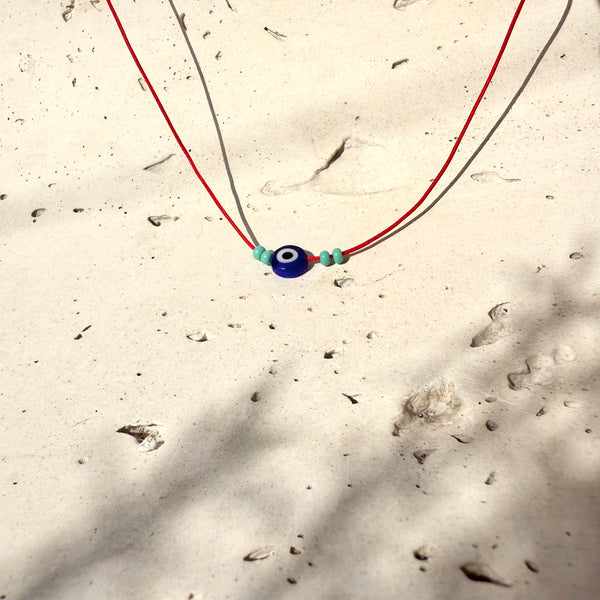 Collar artesanal hilo rojo Good Vibes ojo protector vidrio amuleto ajustable hecho a mano Colombia