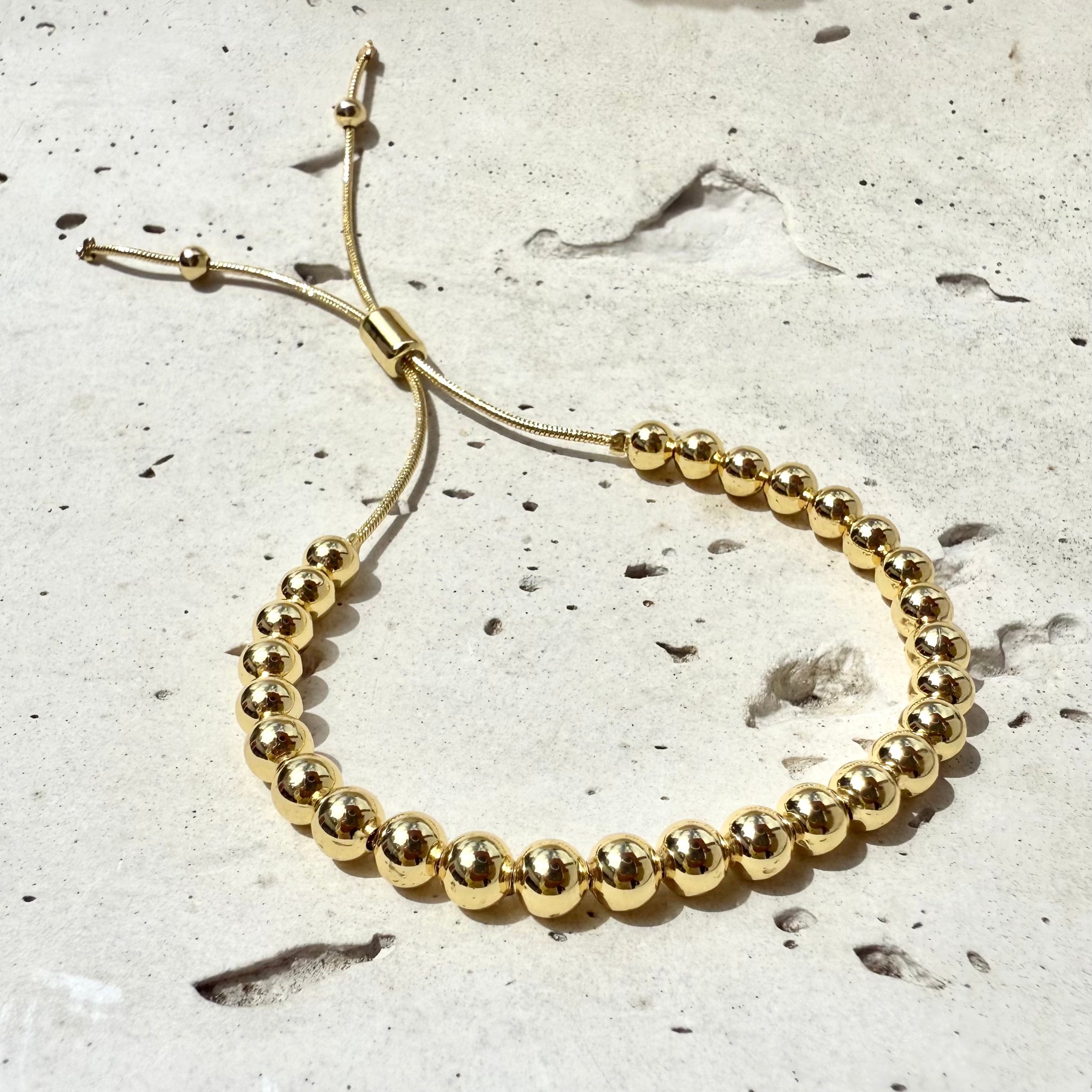 Pulsera Razzi balin dorado