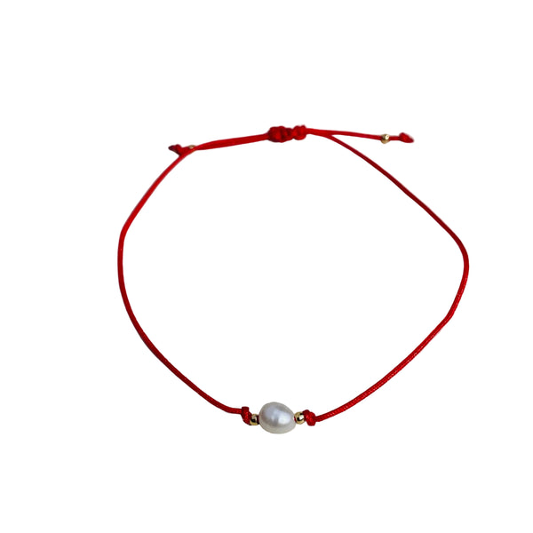 Pulsera de hilo rojo para buena suerte hecha amano