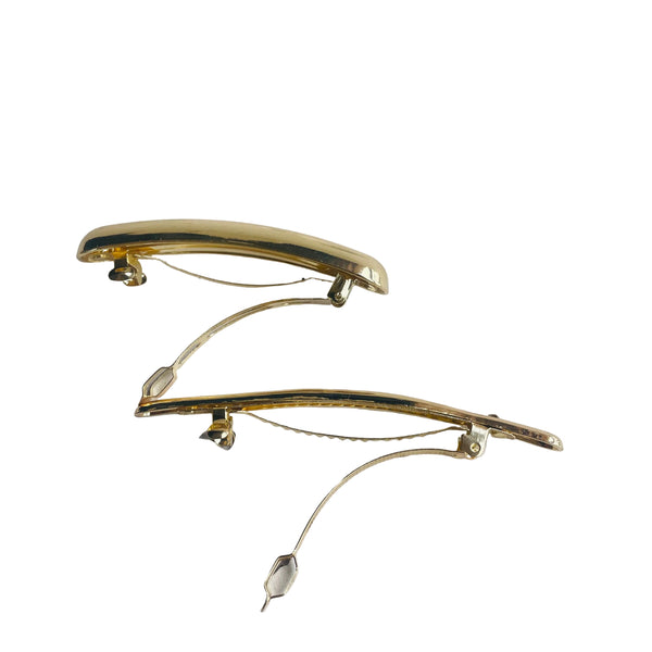 Set de dos hebillas doradas tipo palitroque para el cabello