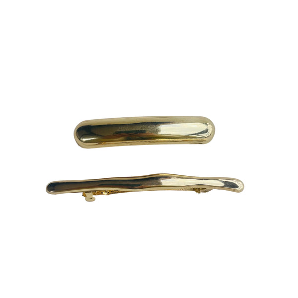 Set de dos hebillas doradas tipo palitroque para el cabello
