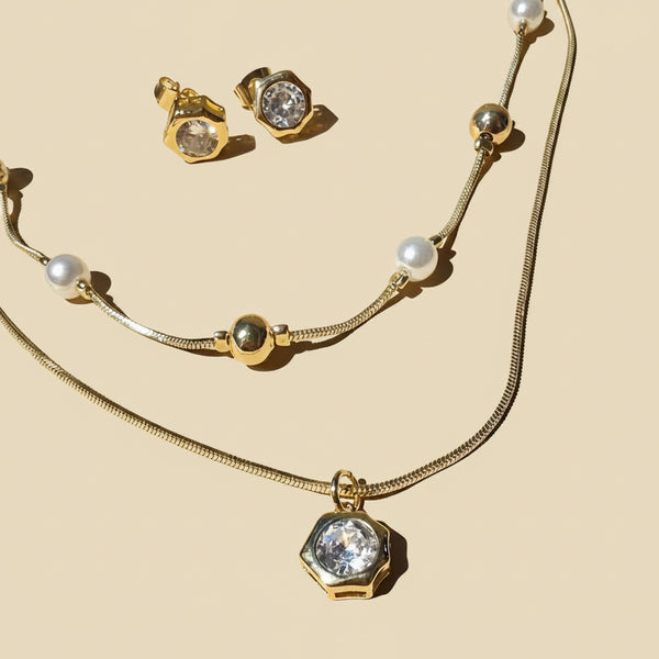 Detalle brillante móvil nivel largo collar doble nivel rodio dorado MariaBolo, colgante que capta la luz en cada gesto elegante sofisticado