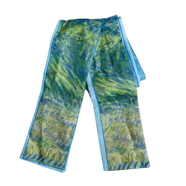 Detalle de cinta de pelo floral celeste, accesorio versátil para turbante y recogidos MariaBolo