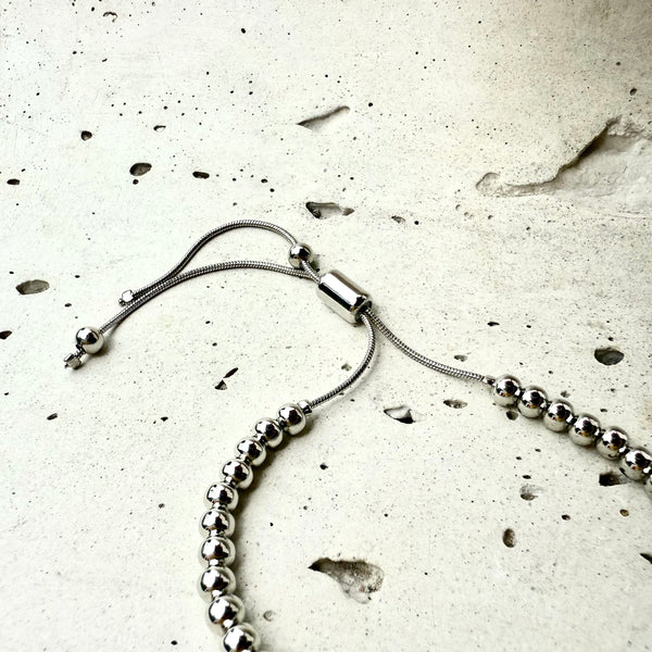 pulsera unisex plateada ajustabñe