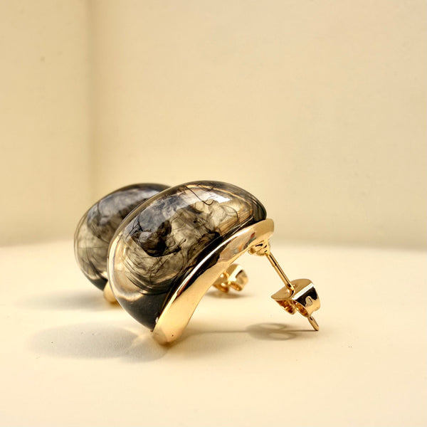 pendientes no cambian de color material rodio tonos negros